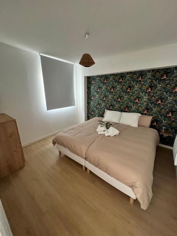 Postel nebo postele na pokoji v ubytování La Case de Joséphine