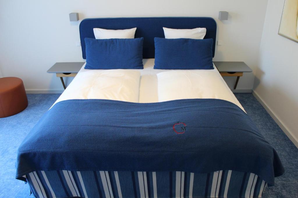 Letto o letti in una camera di Molskroen