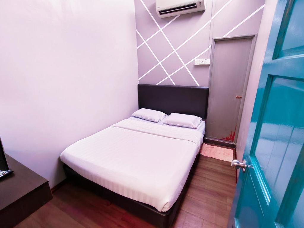Postel nebo postele na pokoji v ubytování Sea Love Homestay Pulau Ketam