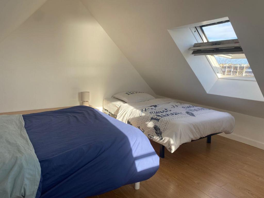 Postel nebo postele na pokoji v ubytování Ty Duplex