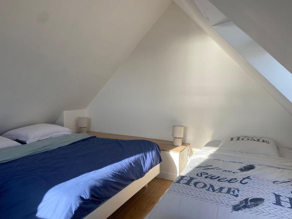 Postel nebo postele na pokoji v ubytování Ty Duplex