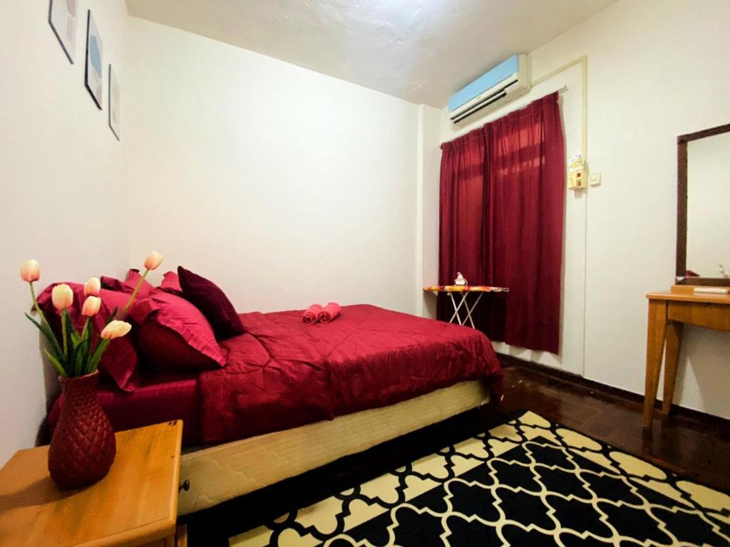 Ένα ή περισσότερα κρεβάτια σε δωμάτιο στο Ennys Homestay Port Dickson 2 Bedroom with pool