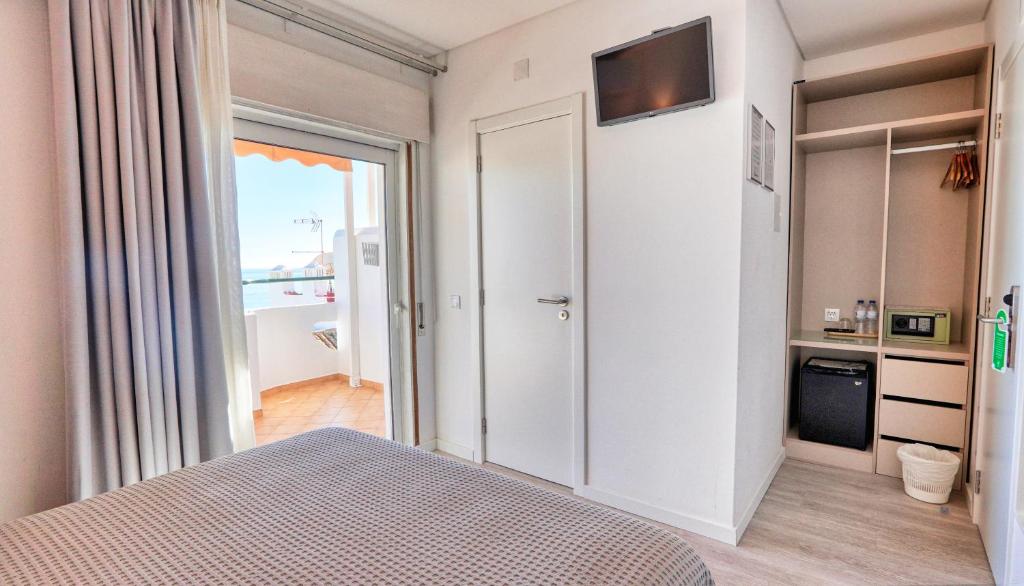 Postel nebo postele na pokoji v ubytování Guest House Dianamar