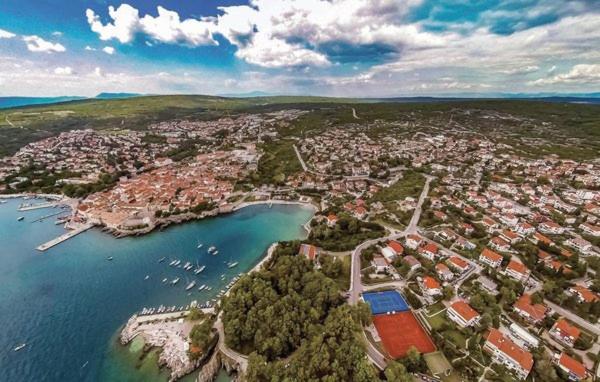 an aerial view of a city with boats in the water at Villa Patrick in Gostinjac