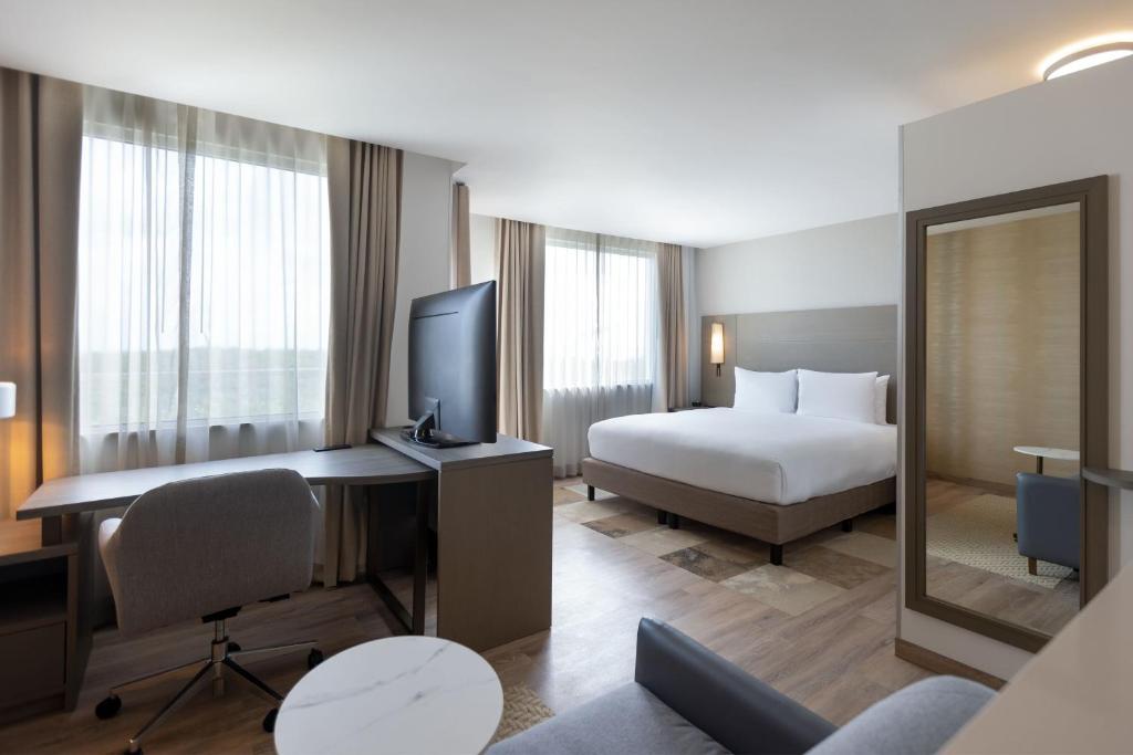 Ένα ή περισσότερα κρεβάτια σε δωμάτιο στο Residence Inn by Marriott Playa del Carmen