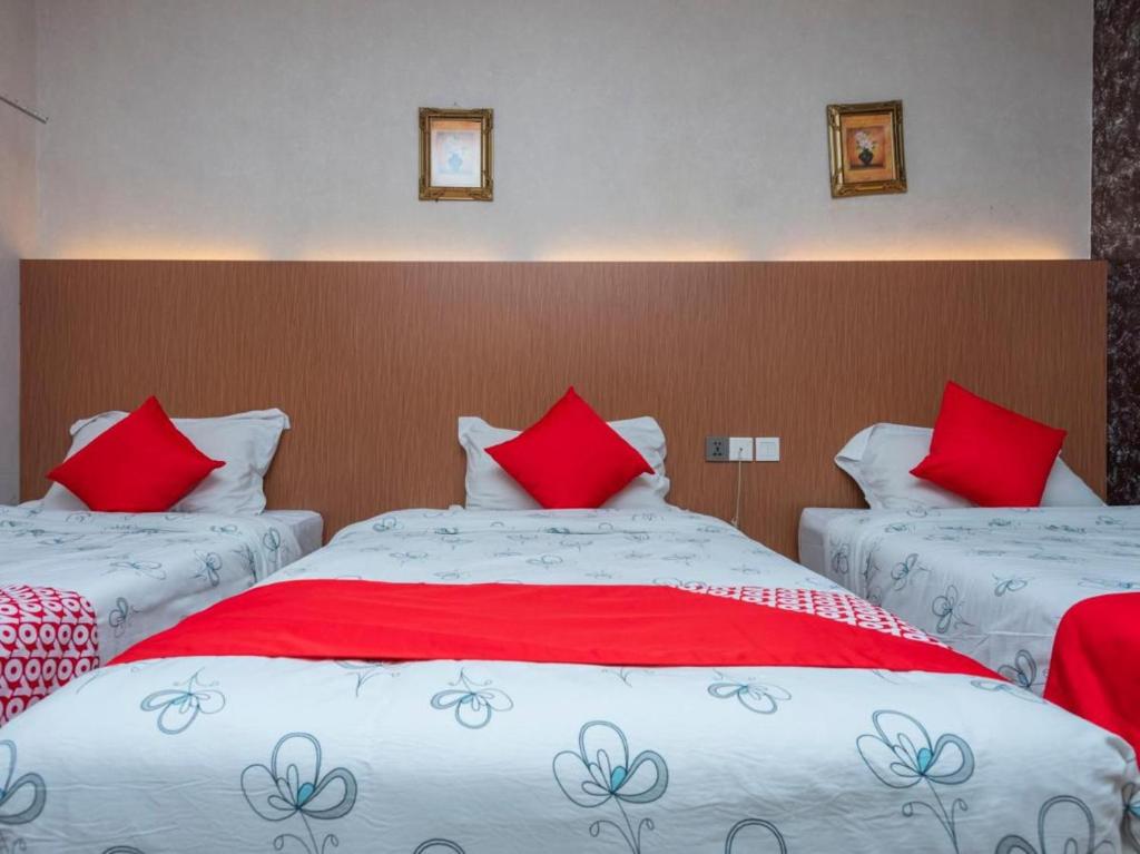 Postel nebo postele na pokoji v ubytování Suan Bee Hotel@Sutera