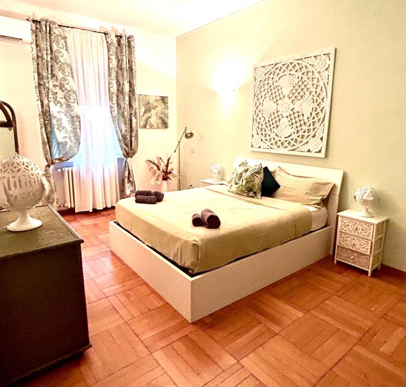 Posteľ alebo postele v izbe v ubytovaní MASOTTO APARTMENT LINATE-Close Center