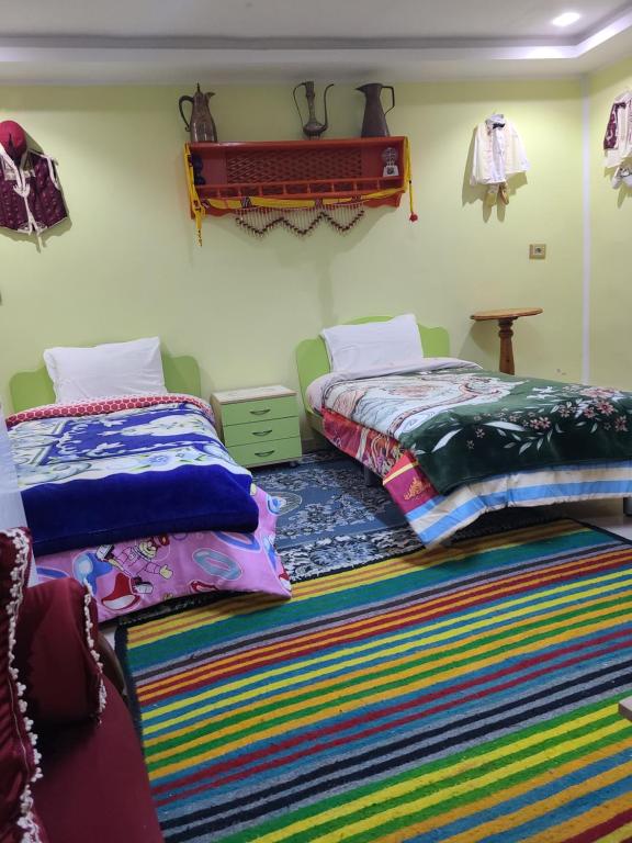 Postel nebo postele na pokoji v ubytování Maison D'hôte Dar Saida