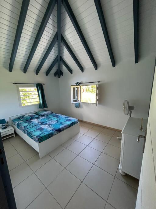 Postel nebo postele na pokoji v ubytování Logement Ghenoah