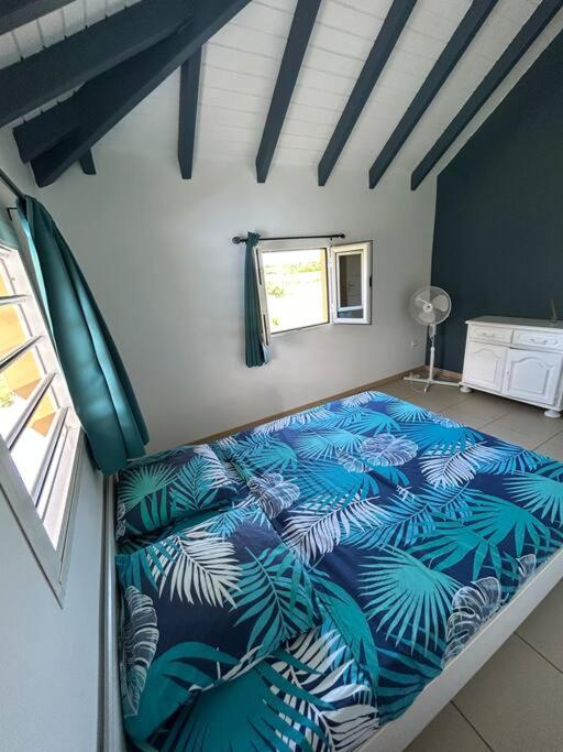 Postel nebo postele na pokoji v ubytování Logement Ghenoah