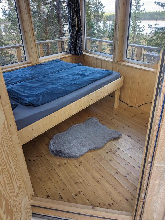Postel nebo postele na pokoji v ubytování Aurora Lodge