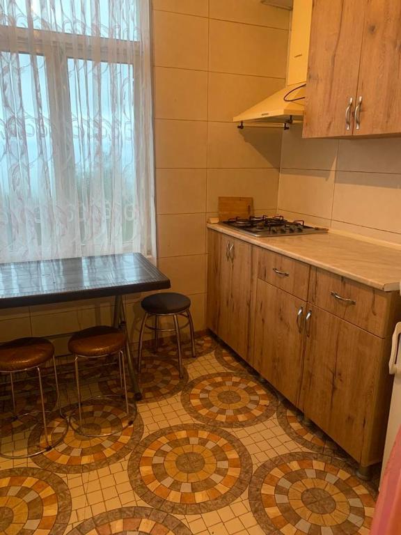 Kuchyň nebo kuchyňský kout v ubytování Guesthouse Tornike