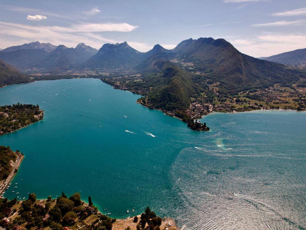 an aerial view of a body of water with mountains at Appartement Annecy, 3 pièces, 6 personnes - FR-1-432-4 in Annecy