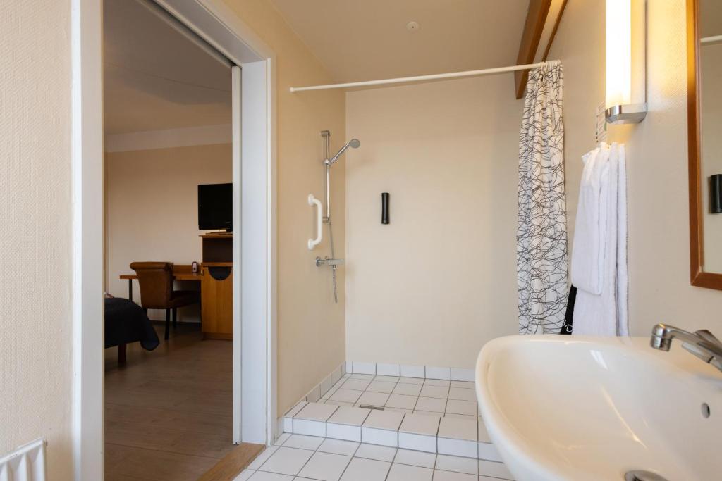 Un baño de Milling Hotel Gestus