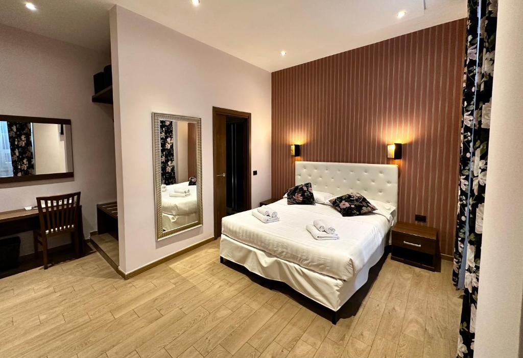 Postel nebo postele na pokoji v ubytování La Grande Bellezza Guest House Rome