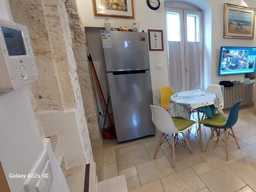 A kitchen or kitchenette at Ostuni Guest House