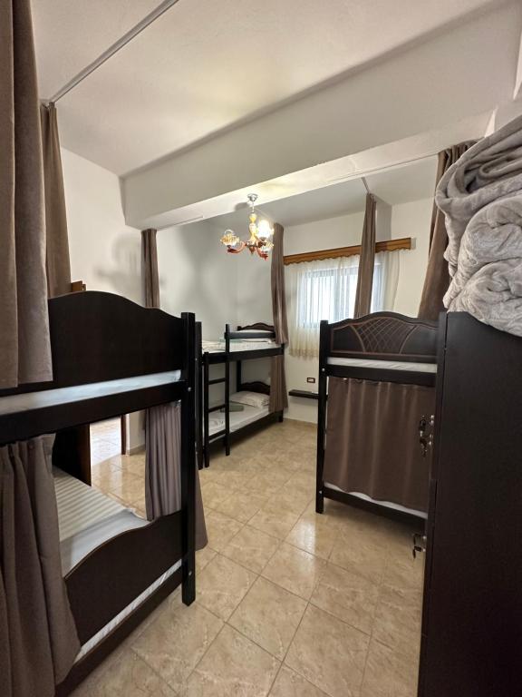Postel nebo postele na pokoji v ubytování Hanna's Hostel