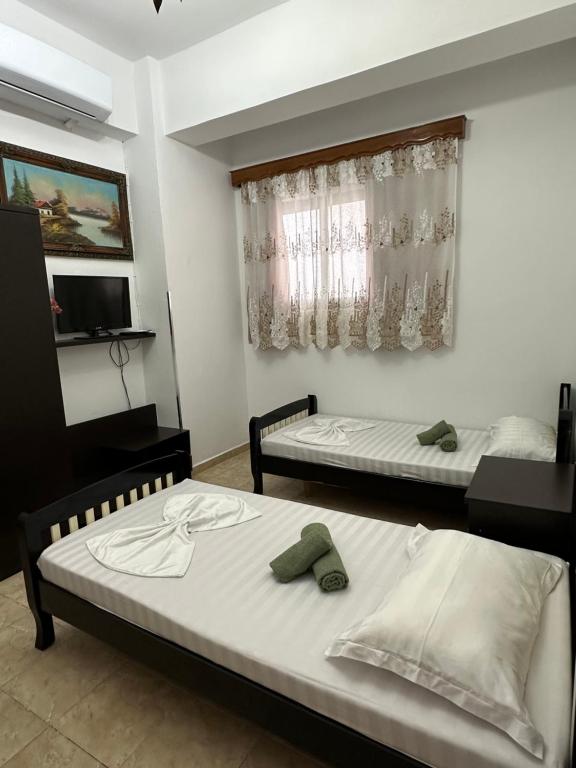 Postel nebo postele na pokoji v ubytování Hanna's Hostel