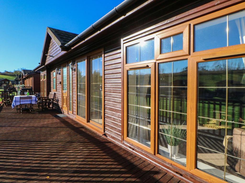 a house with large windows on a deck at The Fairhaven in Richmond