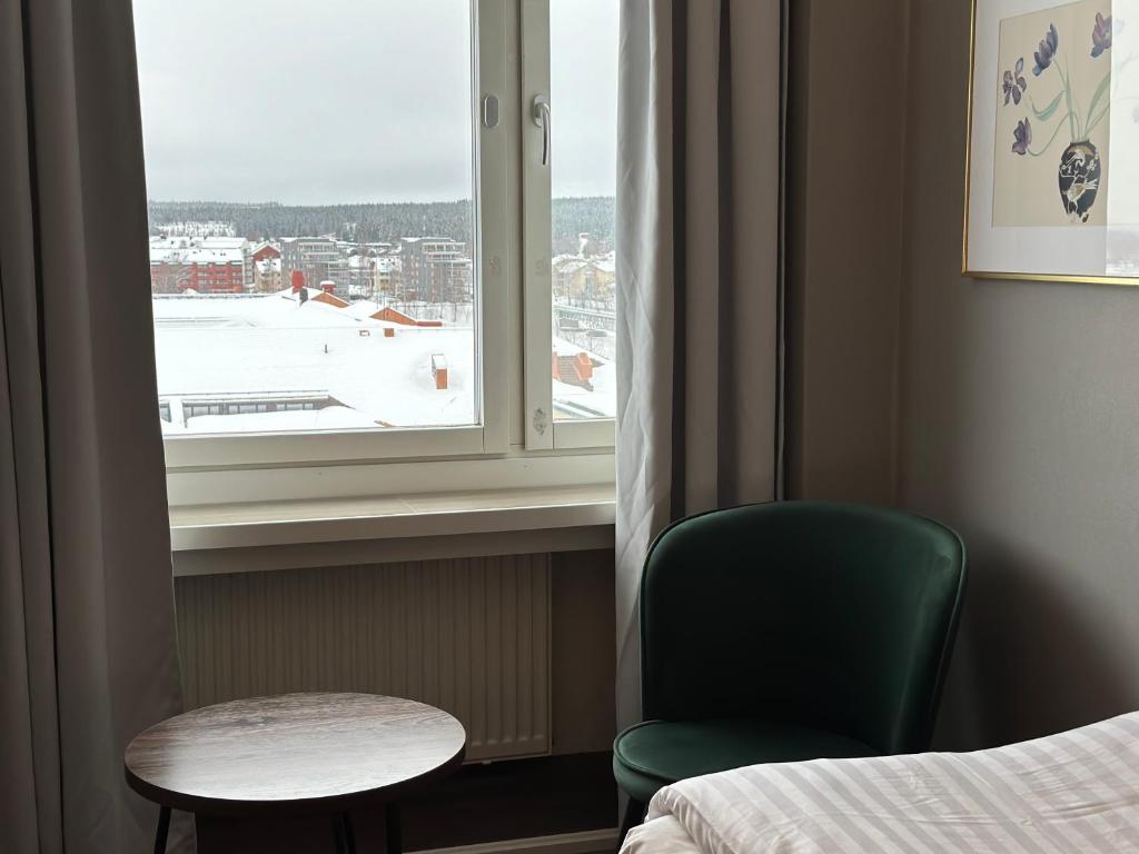 Postel nebo postele na pokoji v ubytování Hotel Victoria