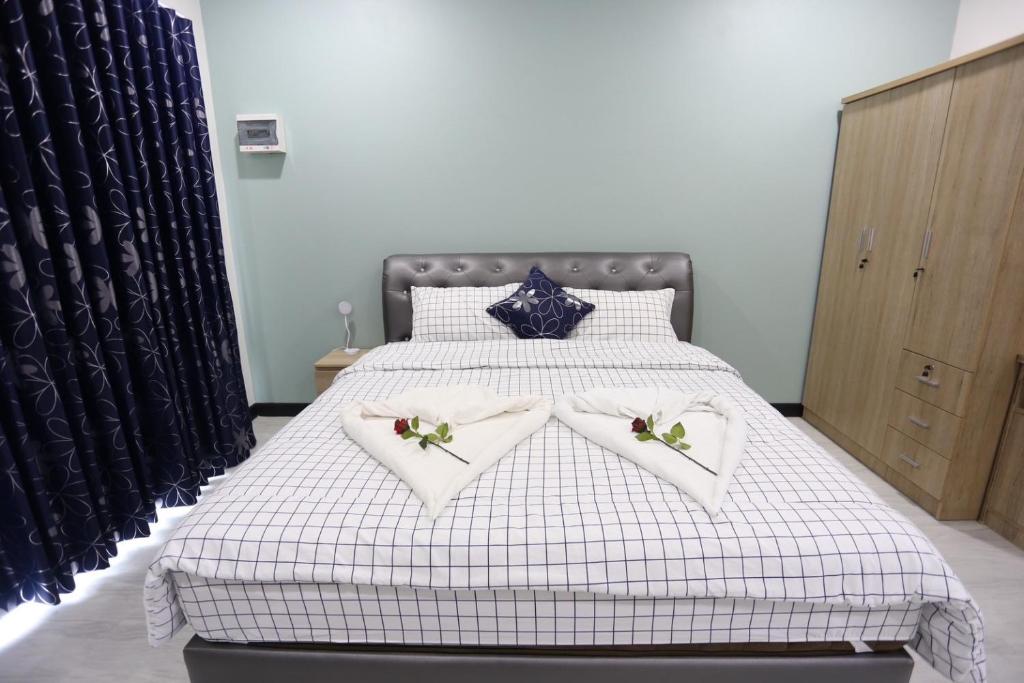 Postel nebo postele na pokoji v ubytování MB House Resort