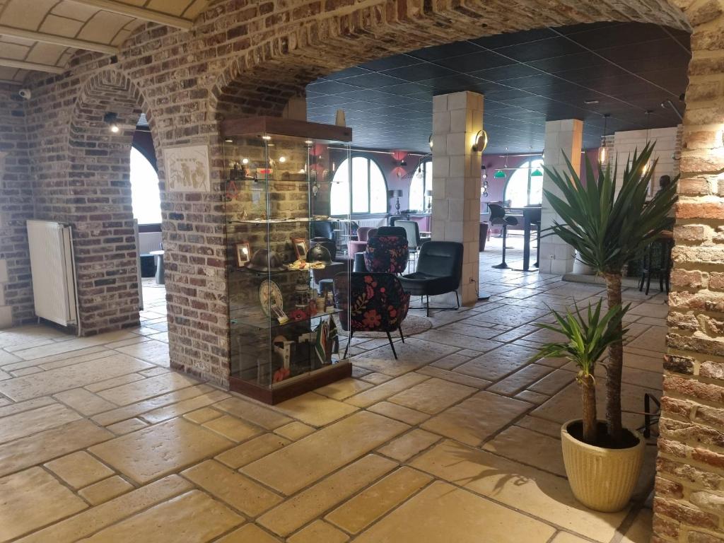Posezení v ubytování Hôtel Le Prieuré