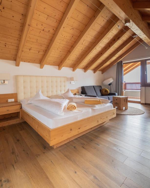 Postel nebo postele na pokoji v ubytování Small Hotel Sonne