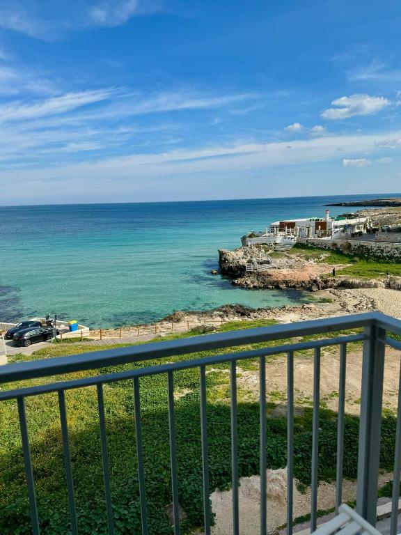 a view of the ocean from a balcony at Live and Love Italy in Monopoli