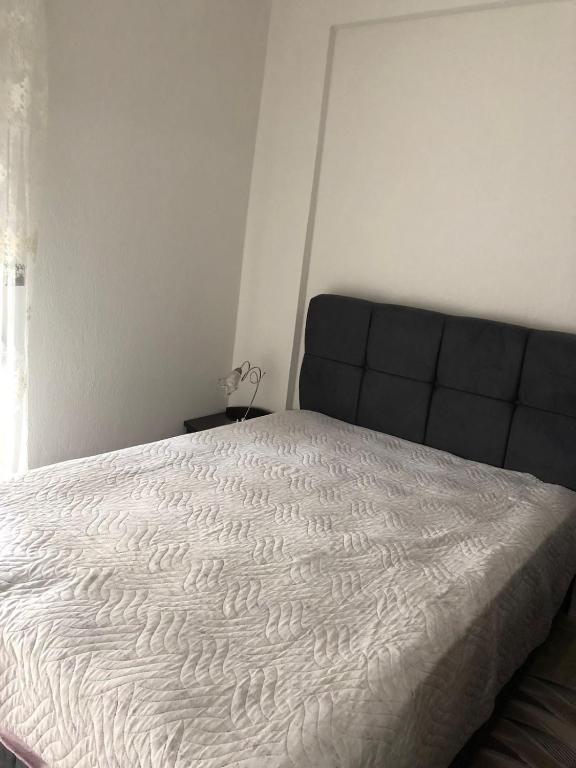 Postel nebo postele na pokoji v ubytování GIAZITZI