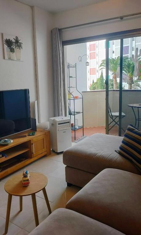 TV a/nebo společenská místnost v ubytování PLAYA DEL INGLES -2 balcons- AGAETE PARK
