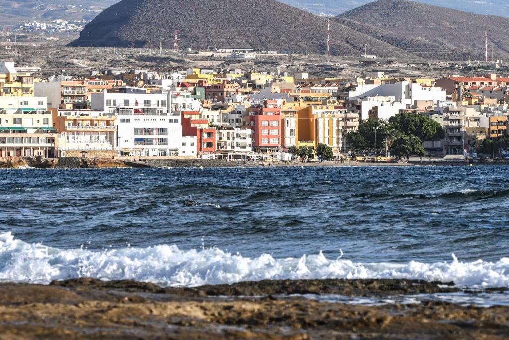 a view of a city from the water at Daydream Medano Coliving in El Médano