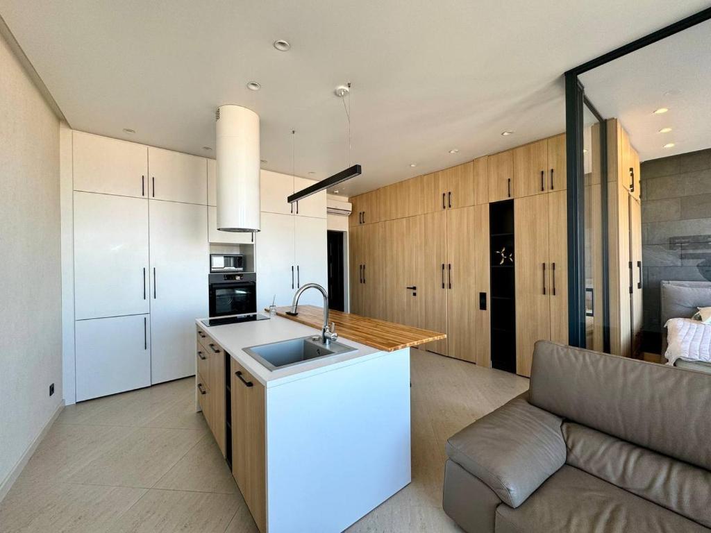 Kuchyň nebo kuchyňský kout v ubytování Arcadia Luxury Apartments