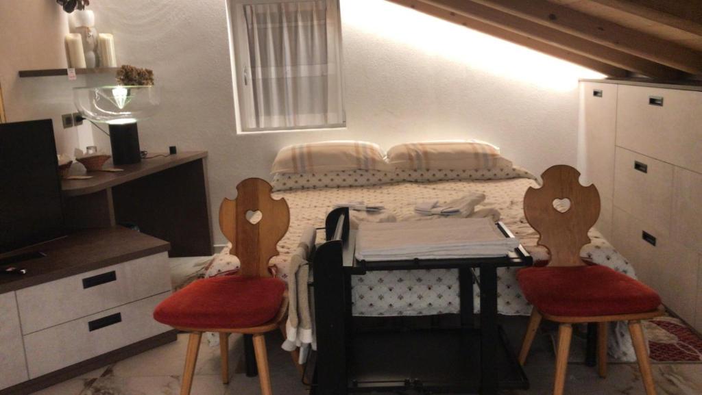Postel nebo postele na pokoji v ubytování Villa Claudia