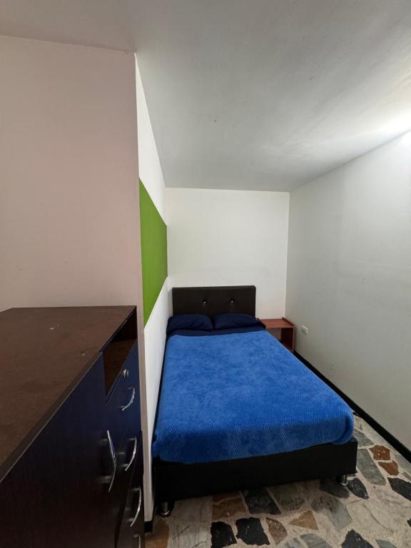 Postel nebo postele na pokoji v ubytování Hostel Bogotá Normandia Tu sitio