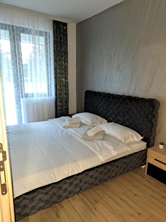 Postel nebo postele na pokoji v ubytování Sumski san 6