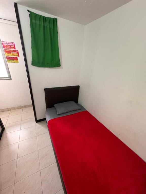 Postel nebo postele na pokoji v ubytování Hostel Bogotá Normandia Tu sitio