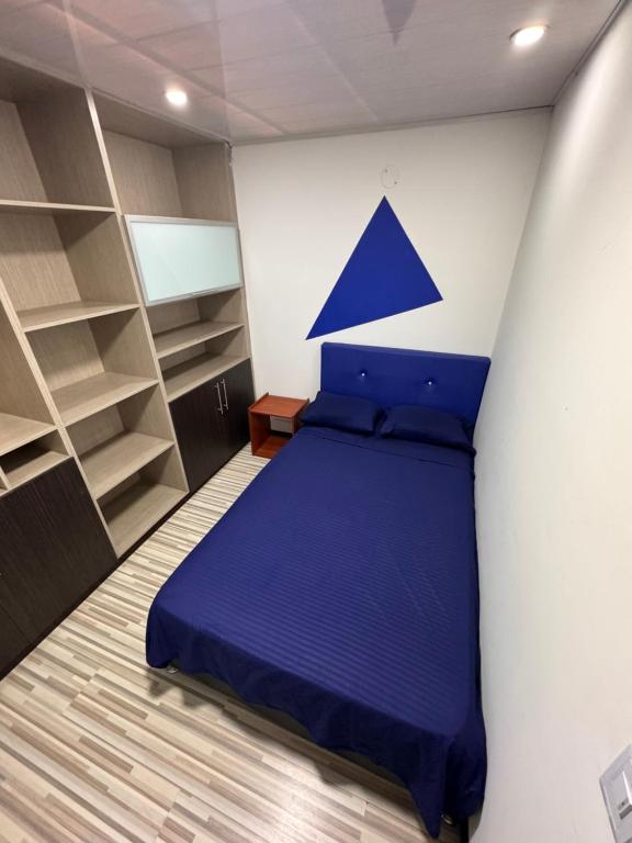 Postel nebo postele na pokoji v ubytování Hostel Bogotá Normandia Tu sitio