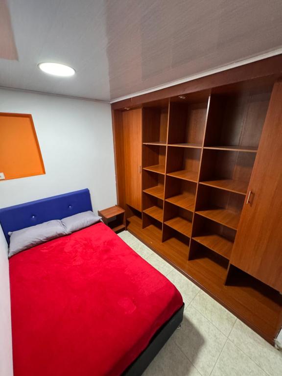 Postel nebo postele na pokoji v ubytování Hostel Bogotá Normandia Tu sitio