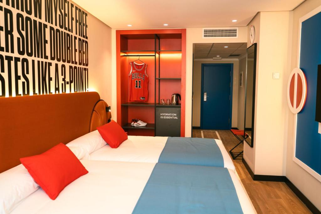Postel nebo postele na pokoji v ubytování Hotel Magic Sports 4