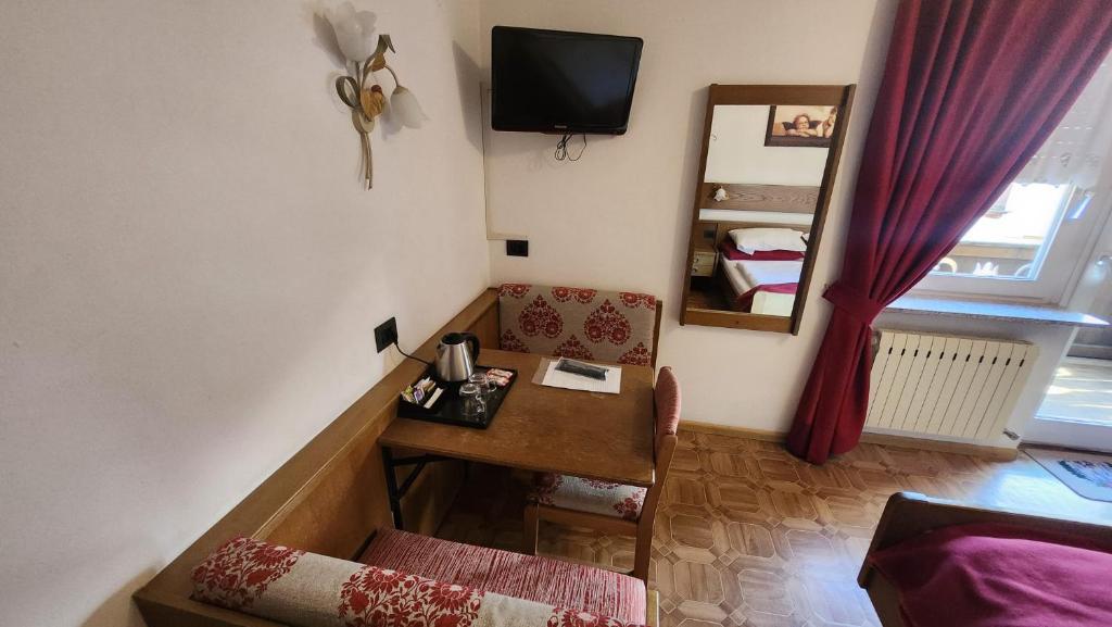 TV a/nebo společenská místnost v ubytování Inter Hotel B&B