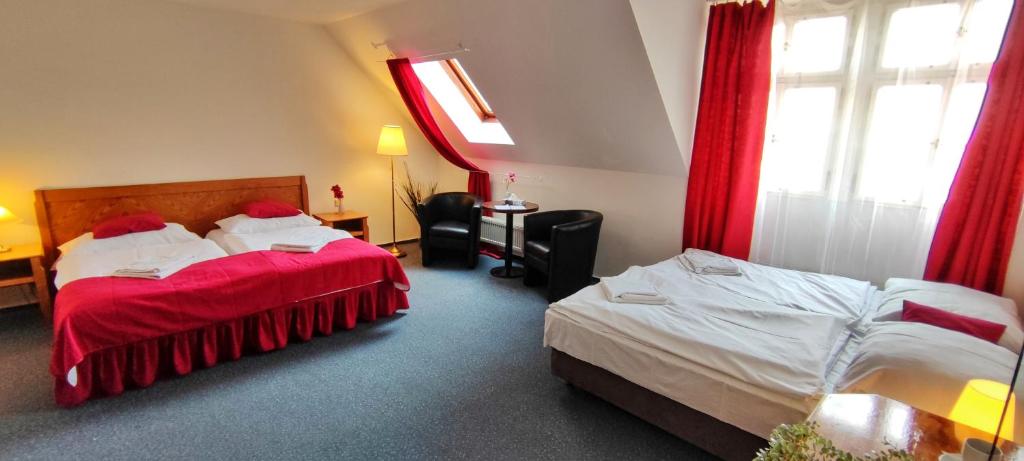 Rúm í herbergi á Hotel Magnolia