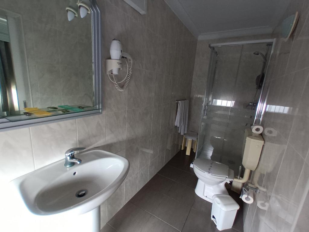 Koupelna v ubytování Hotel Branco I