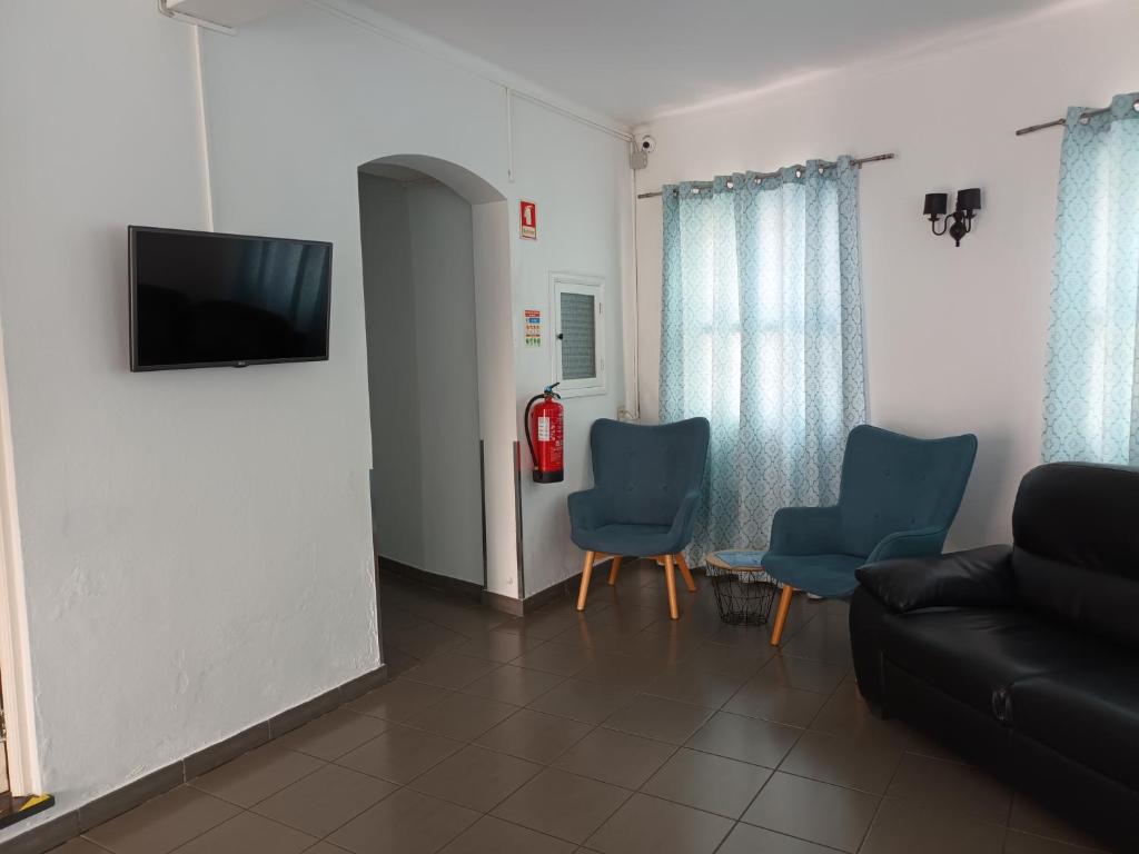 TV a/nebo společenská místnost v ubytování Hotel Branco I