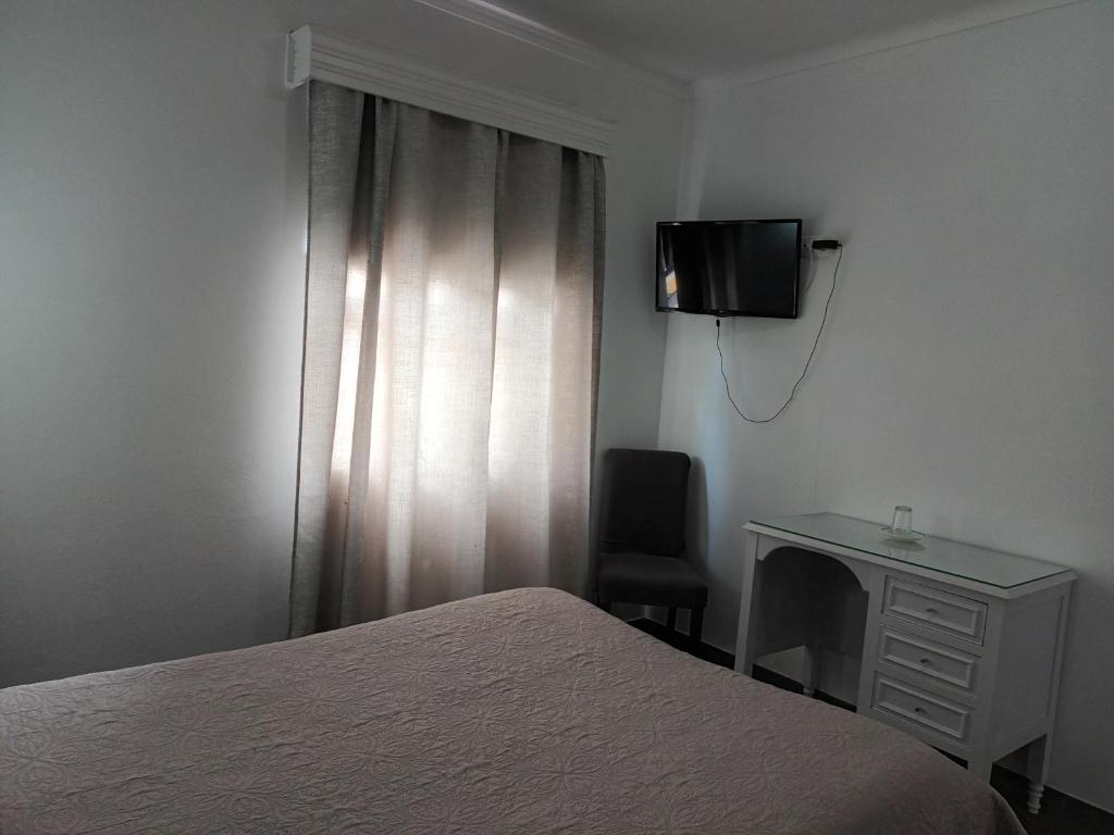 TV a/nebo společenská místnost v ubytování Hotel Branco I