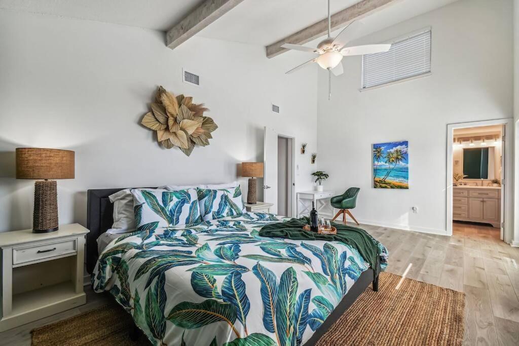 A bed or beds in a room at Hernando Hideaway:Heated Pool/Decks/Dock/Balcony/Yard w/ Firepit/Kayaks