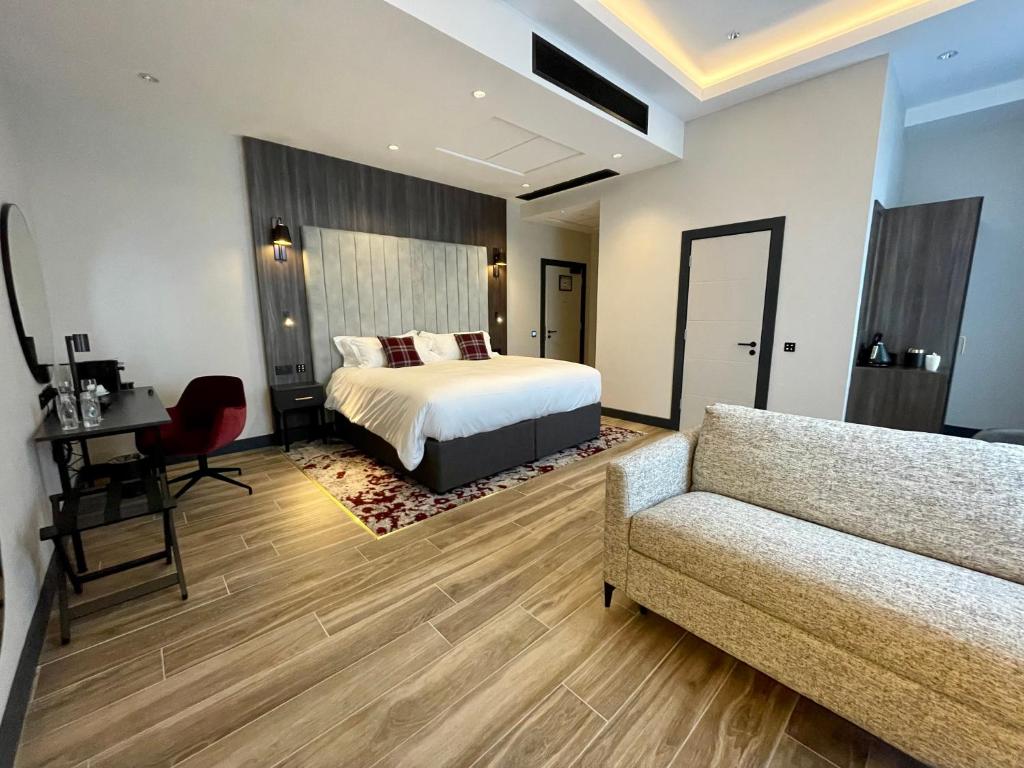 Postel nebo postele na pokoji v ubytování Tynecastle Park Hotel