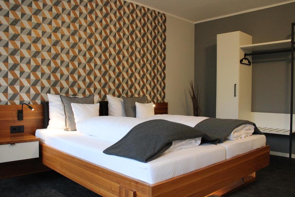 Postel nebo postele na pokoji v ubytování Motel Hasetal