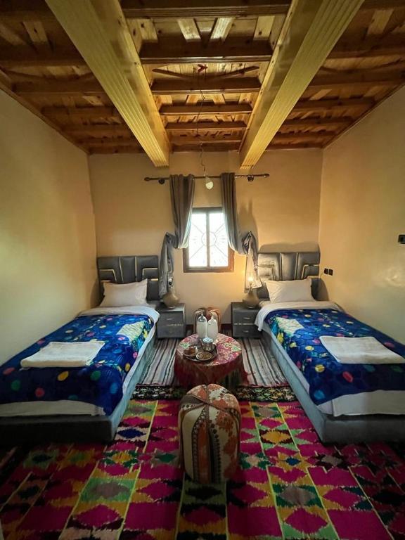 Postel nebo postele na pokoji v ubytování armed family lodge