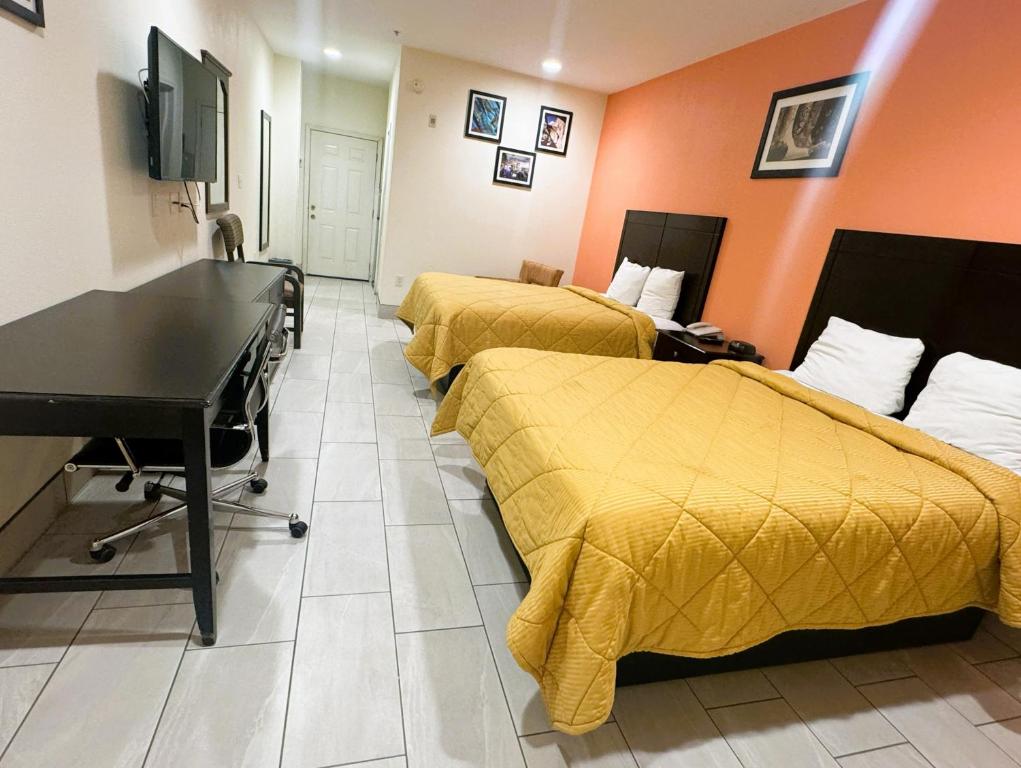 Pecan Valley Inn & Suites - Habitación Doble