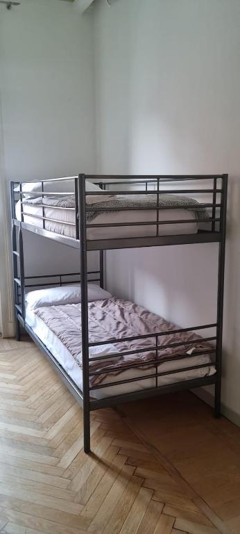 Postel nebo postele na pokoji v ubytování Family Hostel Milano